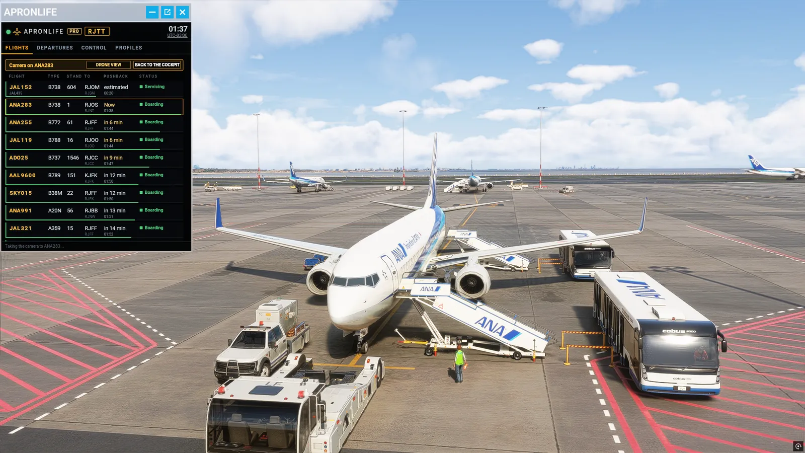 MSFS 2024 screenshot with the ApronLife PRO panel open on the Flights tab and the camera on an ANA 737 with two stairs and two buses.